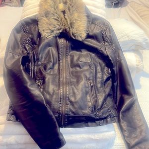 A beautiful look like leather fitted brown, fur-lined coat with faux fur collar